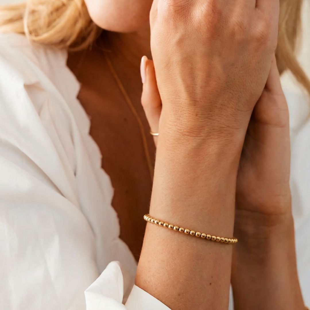 Pulsera Esfera 2mm Acero Baño Oro