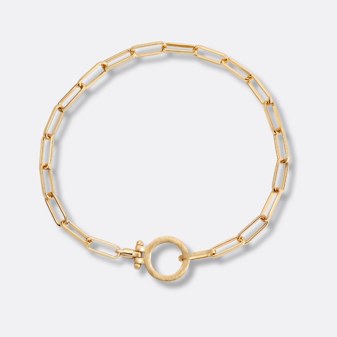 Pulsera Eslabón Círculo Acero Baño Oro