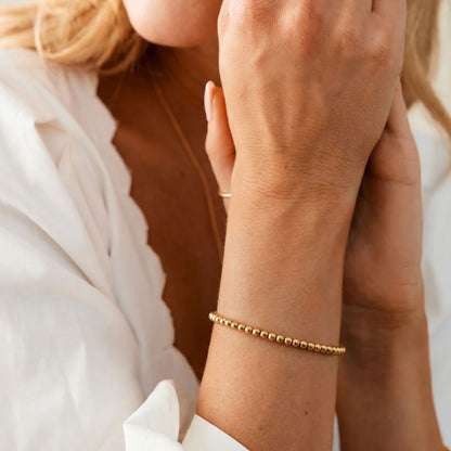 Pulsera Esfera 2mm Acero Baño Oro