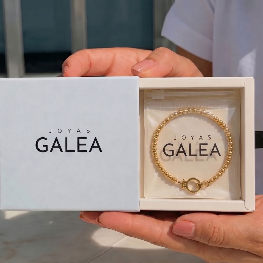 Pulsera Esferas y Círculo Acero Baño Oro