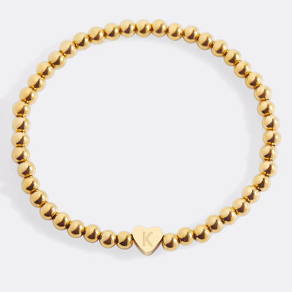 Pulsera Inicial Corazón Acero Baño Oro