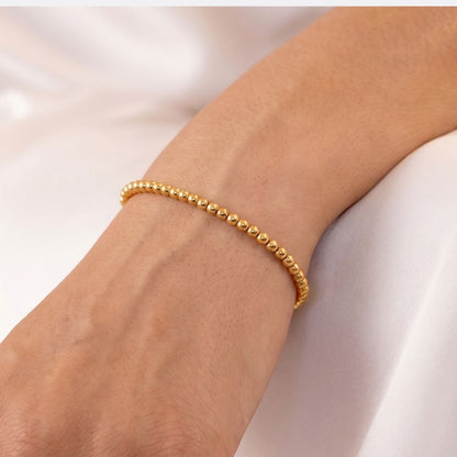 Pulsera Esfera 2mm Acero Baño Oro